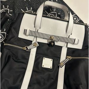 Henri Bendel convertible backpack in Black and white